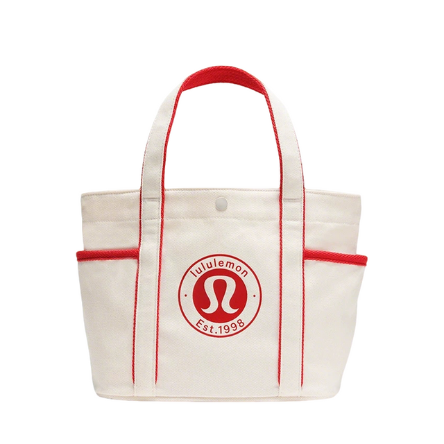 Bolso bandolera de lona resistente al agua con m&uacute;ltiples bolsillos